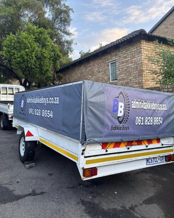 Bakkie Boys wrapped furniture ready for transport